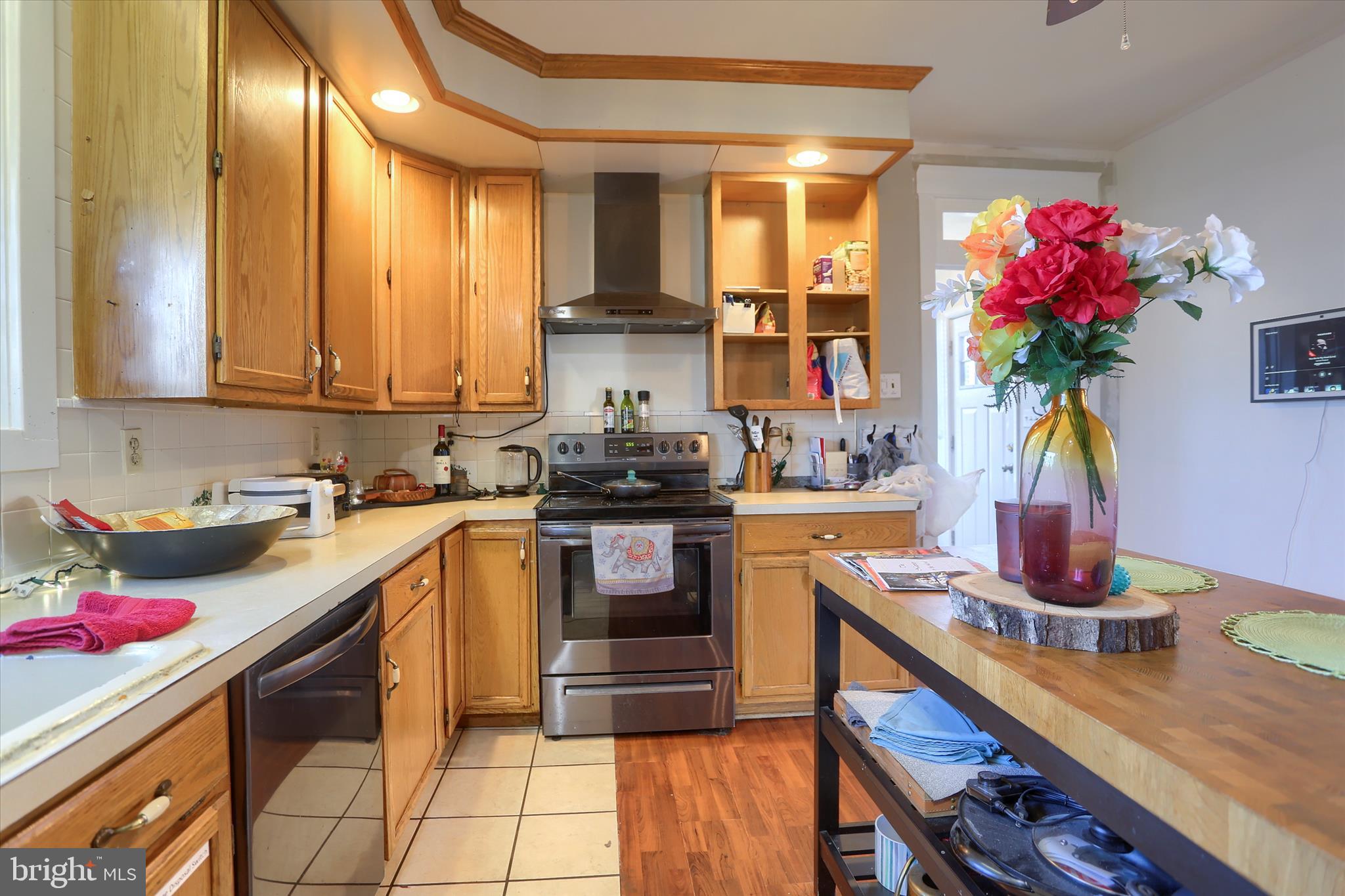 112 Lewisberry Road New Cumberland, PA 17070 - Photo 19 of 56 a kitchen with a sink cabinets and window