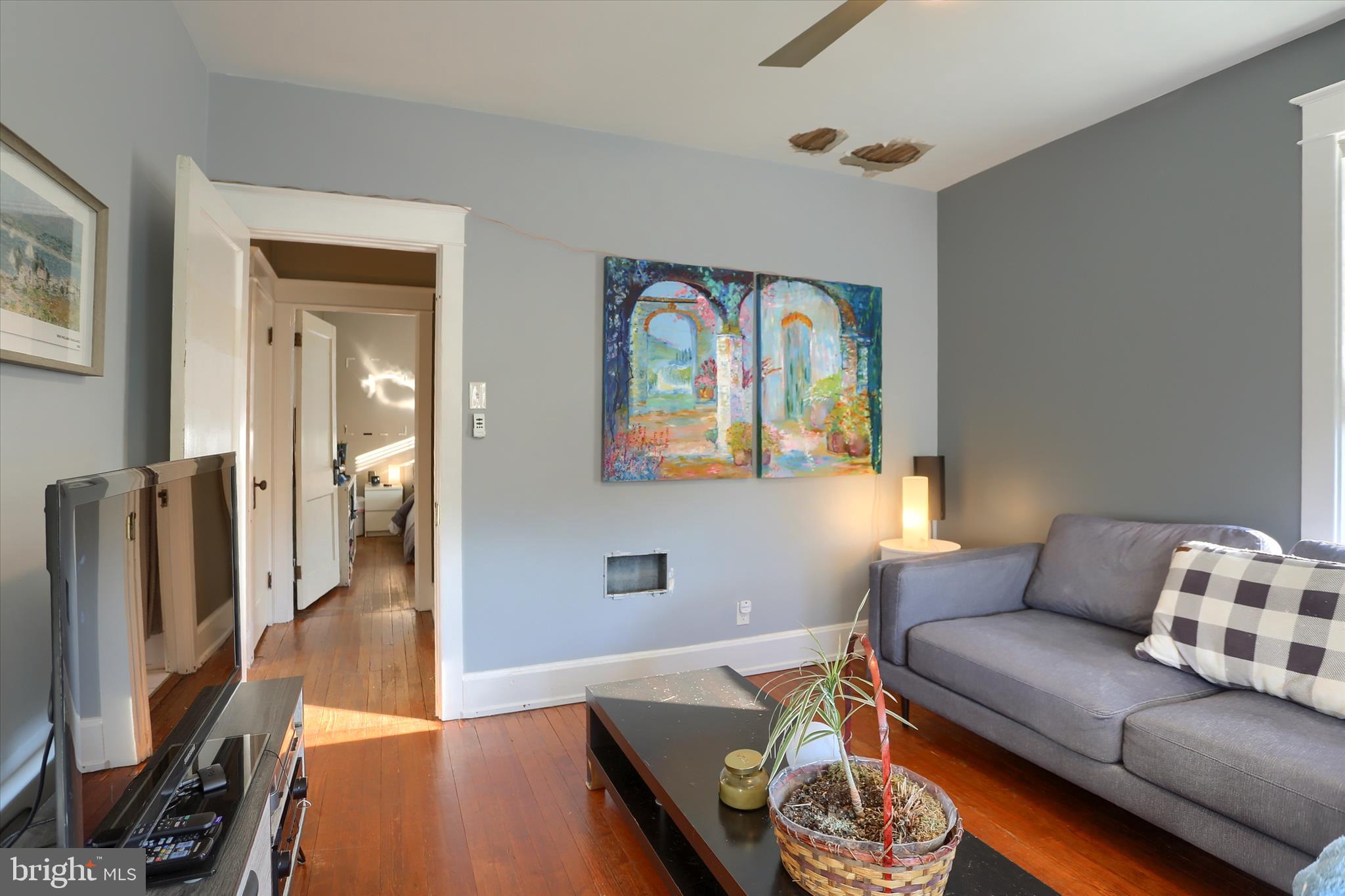 112 Lewisberry Road New Cumberland, PA 17070 - Photo 28 of 56 a living room with furniture and a flat screen tv