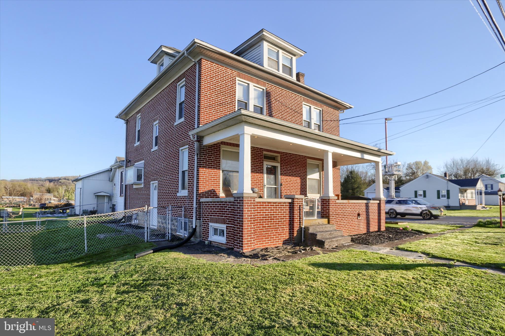 112 Lewisberry Road New Cumberland, PA 17070 - Photo 3 of 56 a front view of a house with a yard