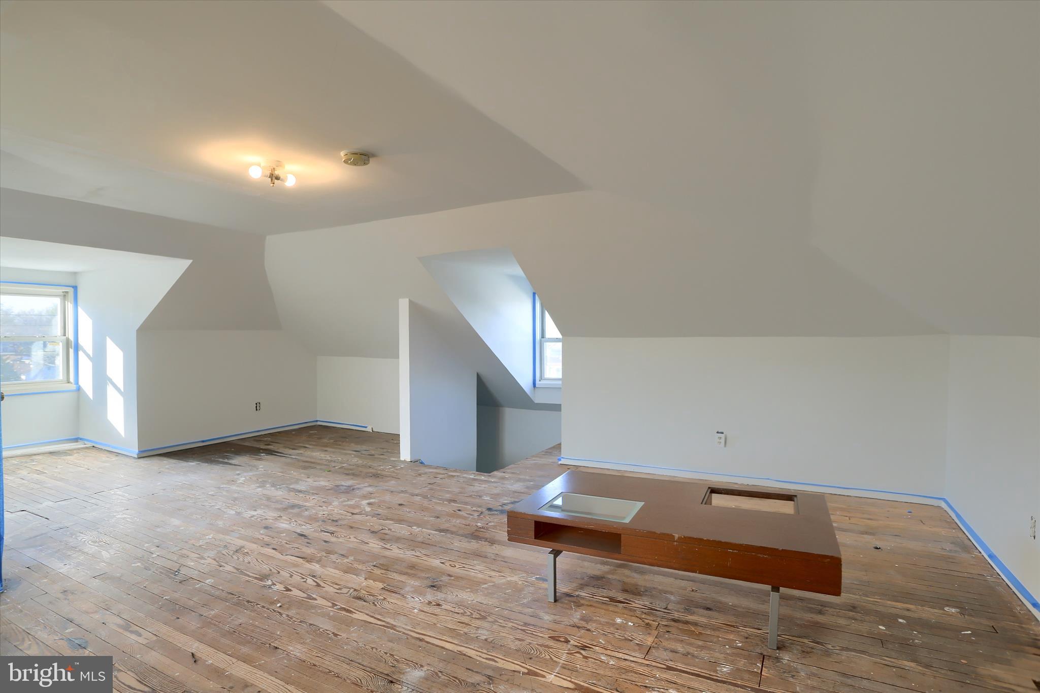 112 Lewisberry Road New Cumberland, PA 17070 - Photo 33 of 56 a view of room with stairs and wooden floor