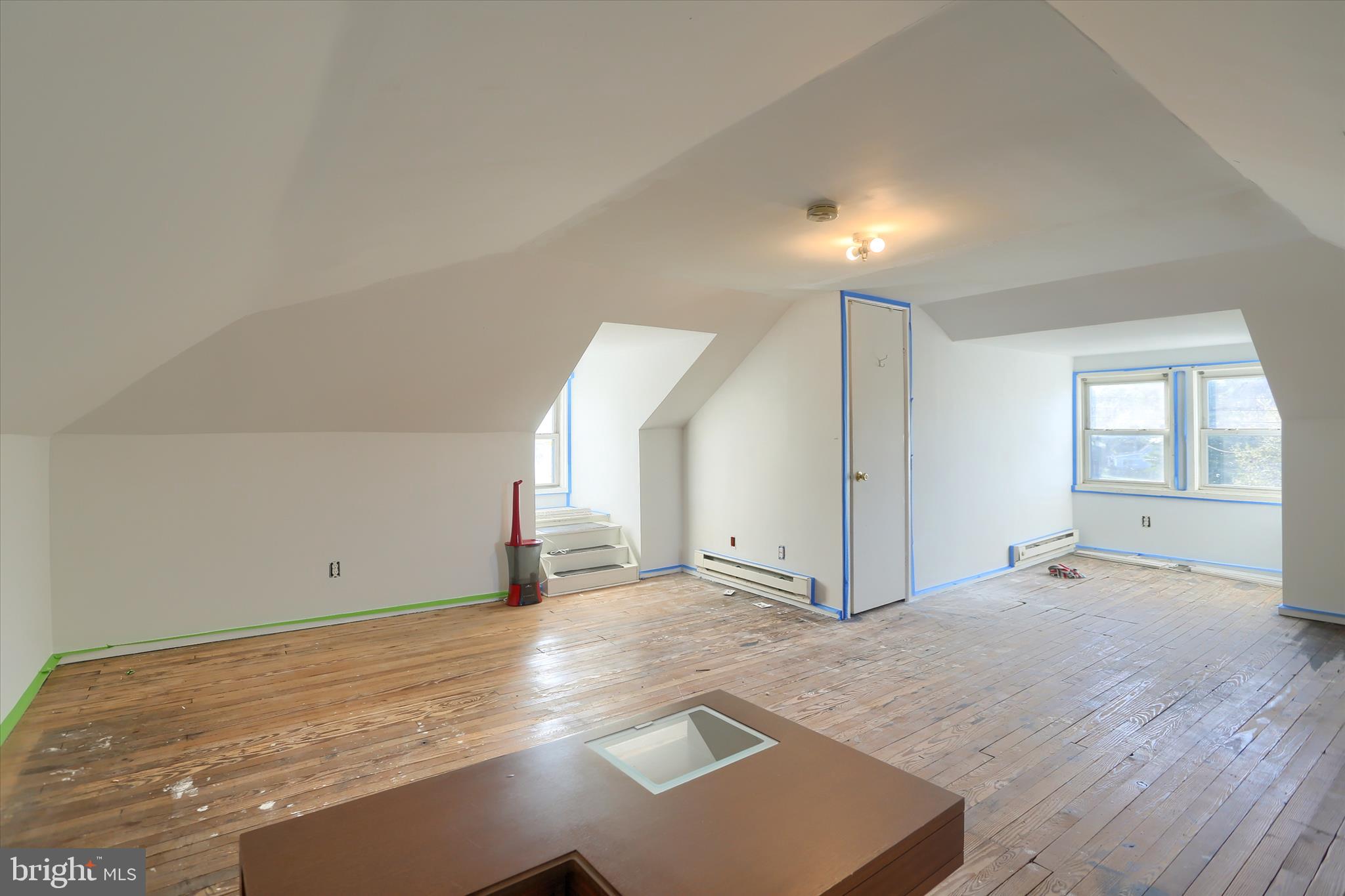 112 Lewisberry Road New Cumberland, PA 17070 - Photo 34 of 56 an empty room with wooden floor and windows