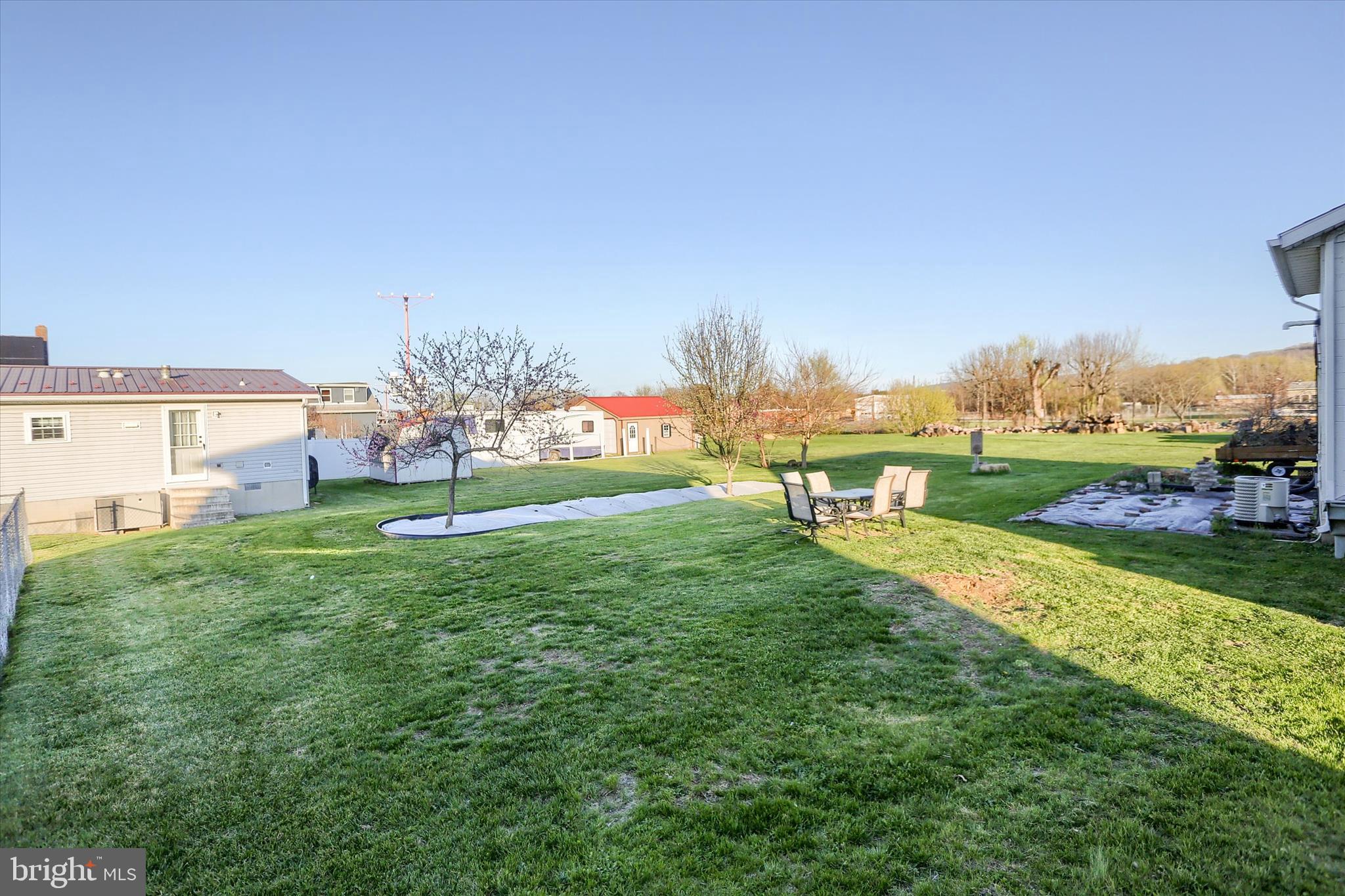 112 Lewisberry Road New Cumberland, PA 17070 - Photo 36 of 56 a view of a park with large trees and a wooden fence
