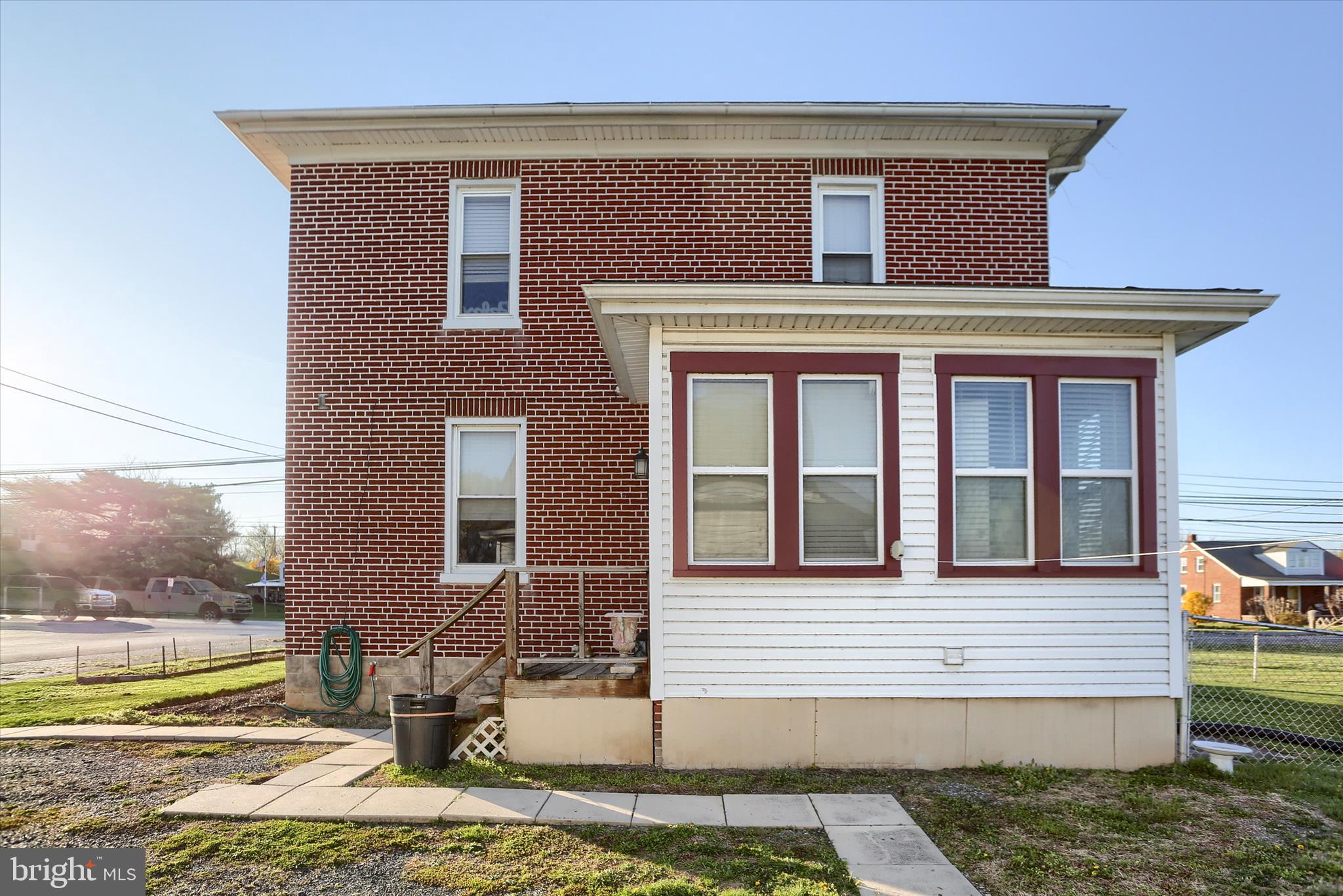 112 Lewisberry Road New Cumberland, PA 17070 - Photo 40 of 56 a front view of a house with a yard