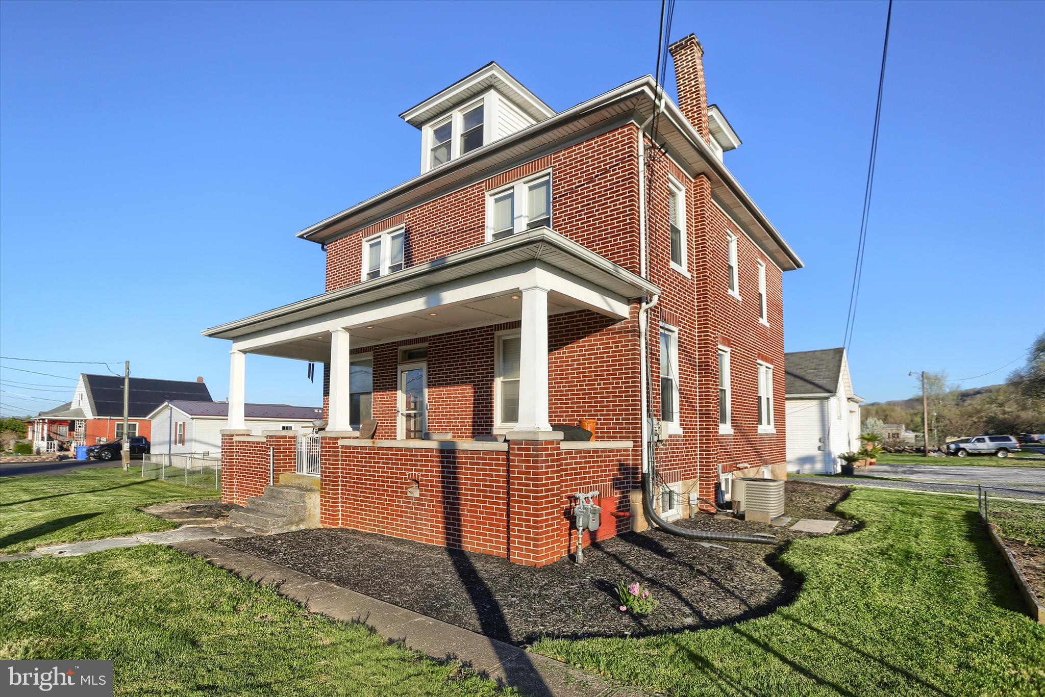 112 Lewisberry Road New Cumberland, PA 17070 - Photo 4 of 56 a front view of a house with a yard