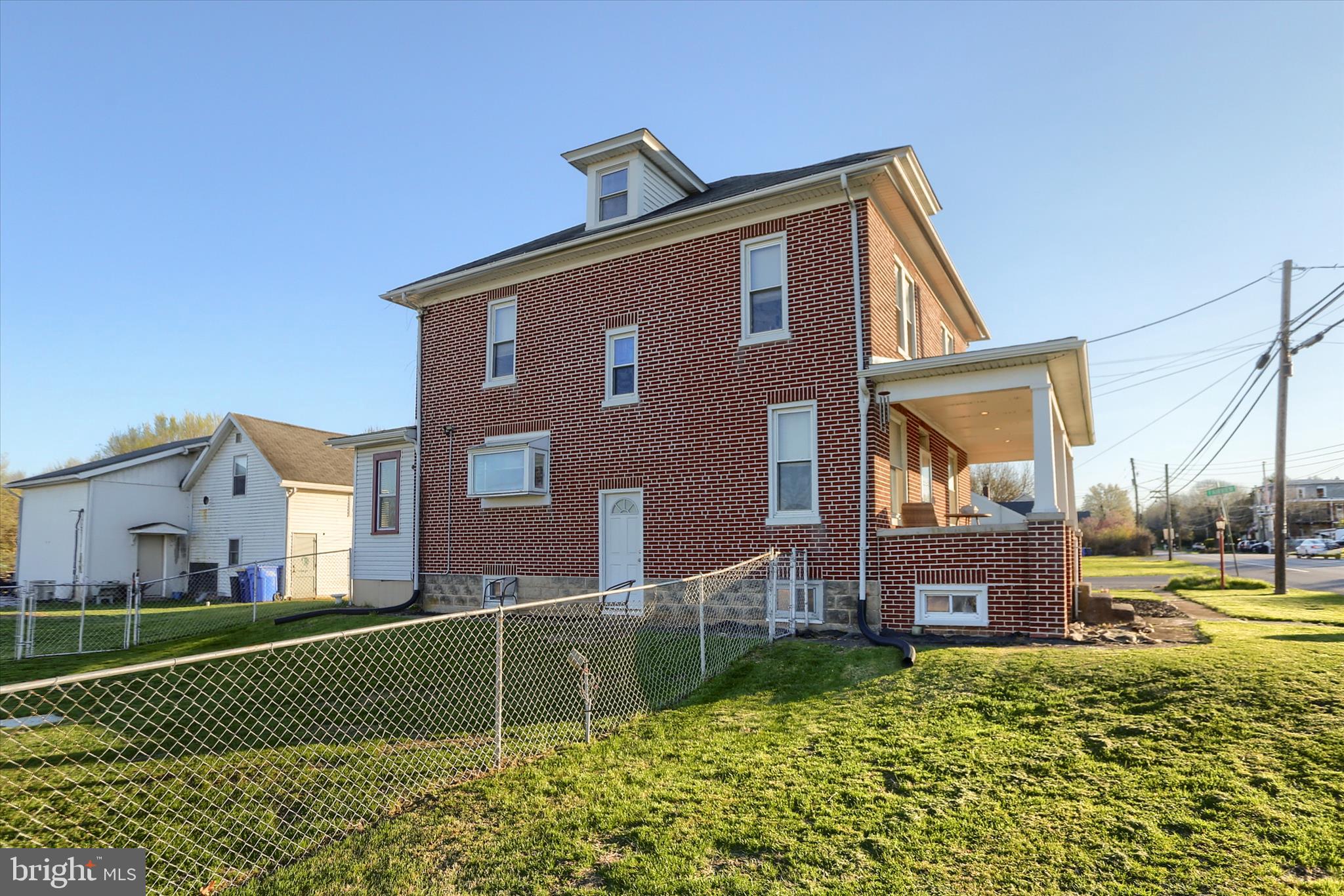112 Lewisberry Road New Cumberland, PA 17070 - Photo 43 of 56 a front view of a house with a yard