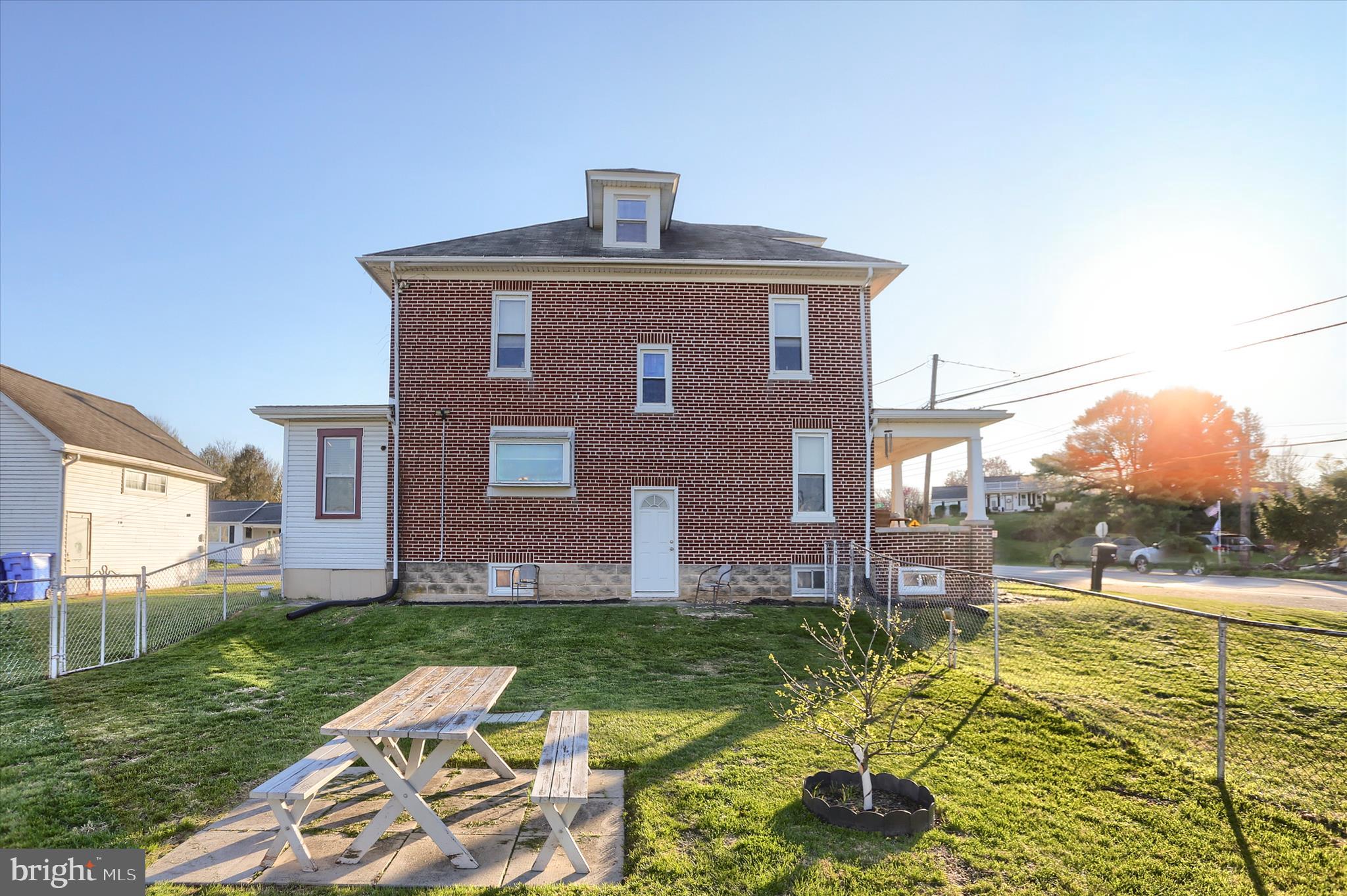 112 Lewisberry Road New Cumberland, PA 17070 - Photo 44 of 56 a front view of a house with garden
