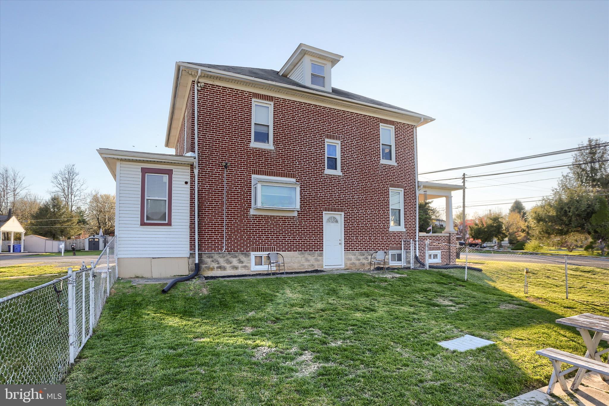 112 Lewisberry Road New Cumberland, PA 17070 - Photo 45 of 56 a front view of house with yard and green space