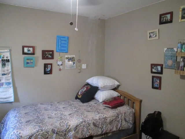 a house view with a backyard space