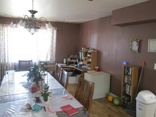 a kitchen with a sink and a stove top oven
