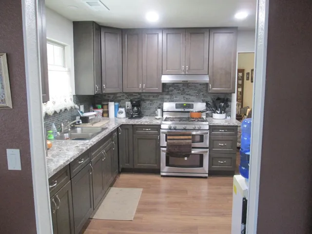 a view of a dining room with furniture and window
