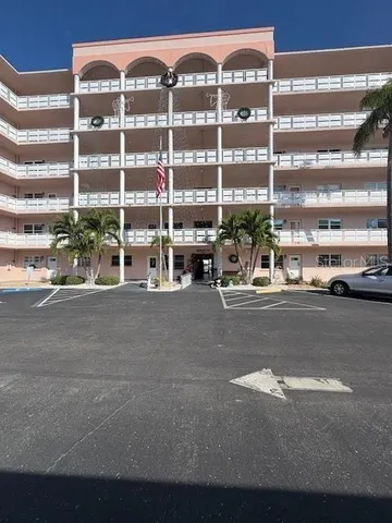 a living room filled with a lots of windows