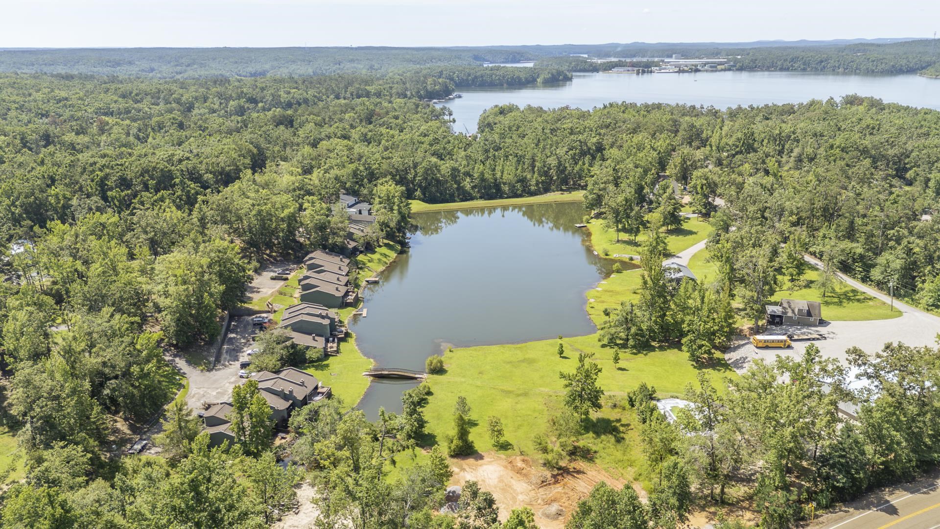 74 Driftwood Road Counce, TN 38326 - Photo 2 of 40 Expansive property featuring a private lake and surrounding woodland. The large body of water is Pickwick Lake.