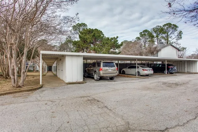 a view of a swimming pool with a lounge chairs