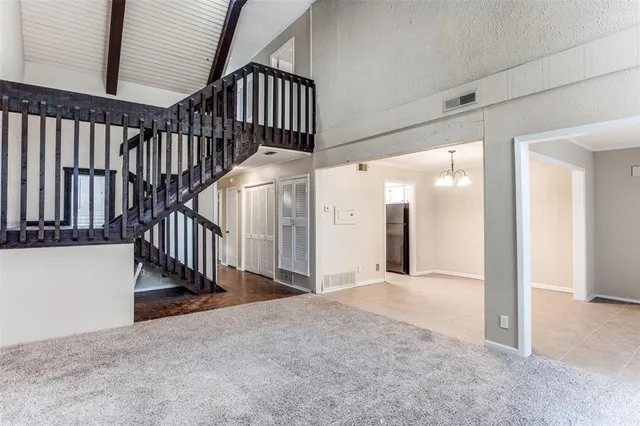 a view of a park with large trees