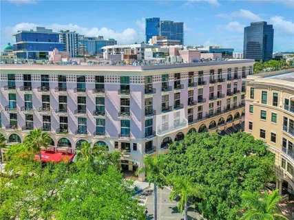 a view of a cafe with sitting area