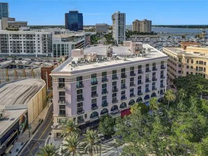an aerial view of a house with a lake view
