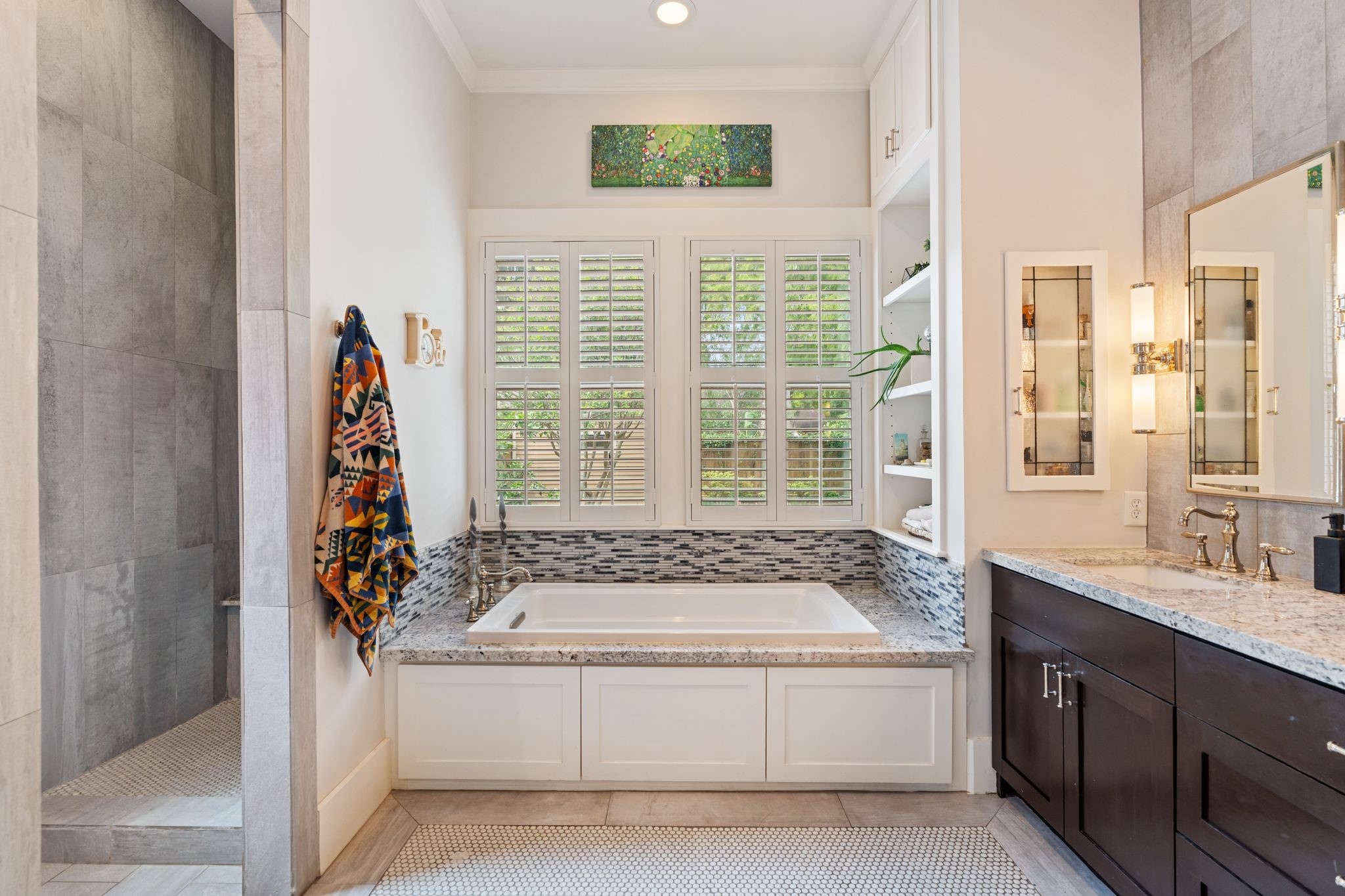 1421 Columbia Street Houston, TX 77008 - Photo 15 of 32 a spacious bathroom with a granite countertop tub and a sink