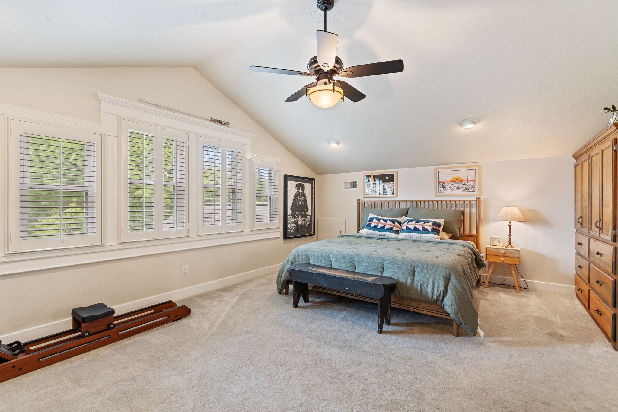 1421 Columbia Street Houston, TX 77008 - Photo 21 of 32 a bedroom with a bed and a chandelier