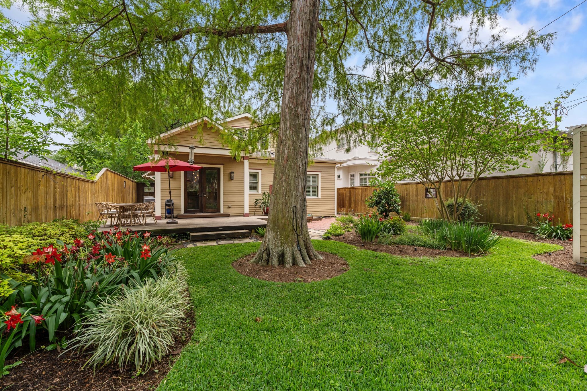 1421 Columbia Street Houston, TX 77008 - Photo 26 of 32 a view of a house with a yard and garden