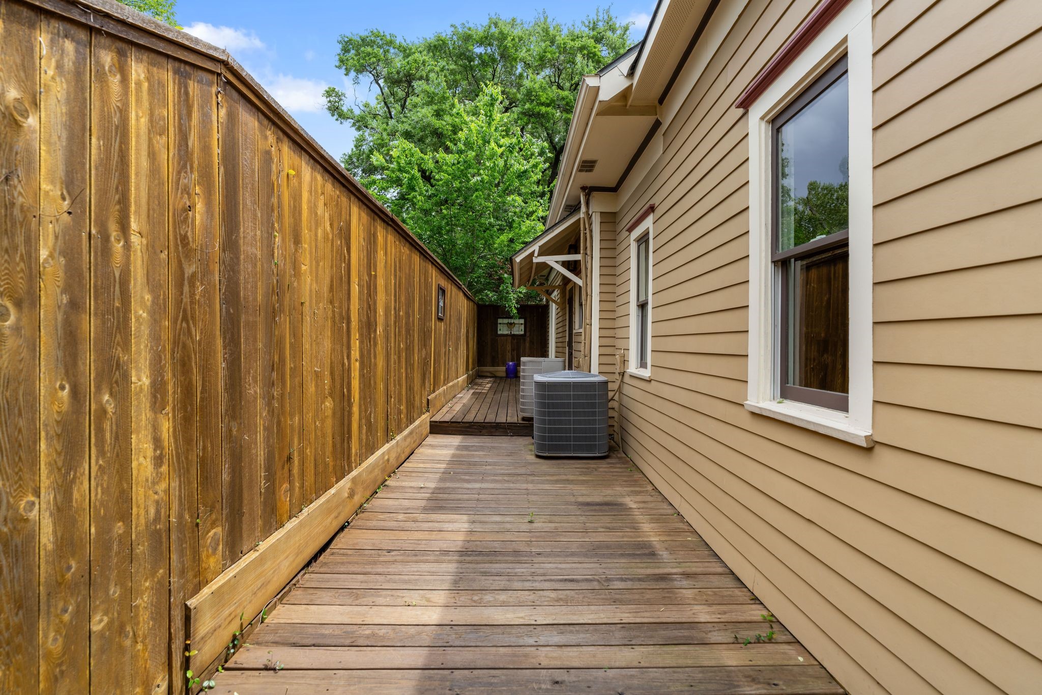 1421 Columbia Street Houston, TX 77008 - Photo 29 of 32 a view of a balcony with wooden floor and staircase