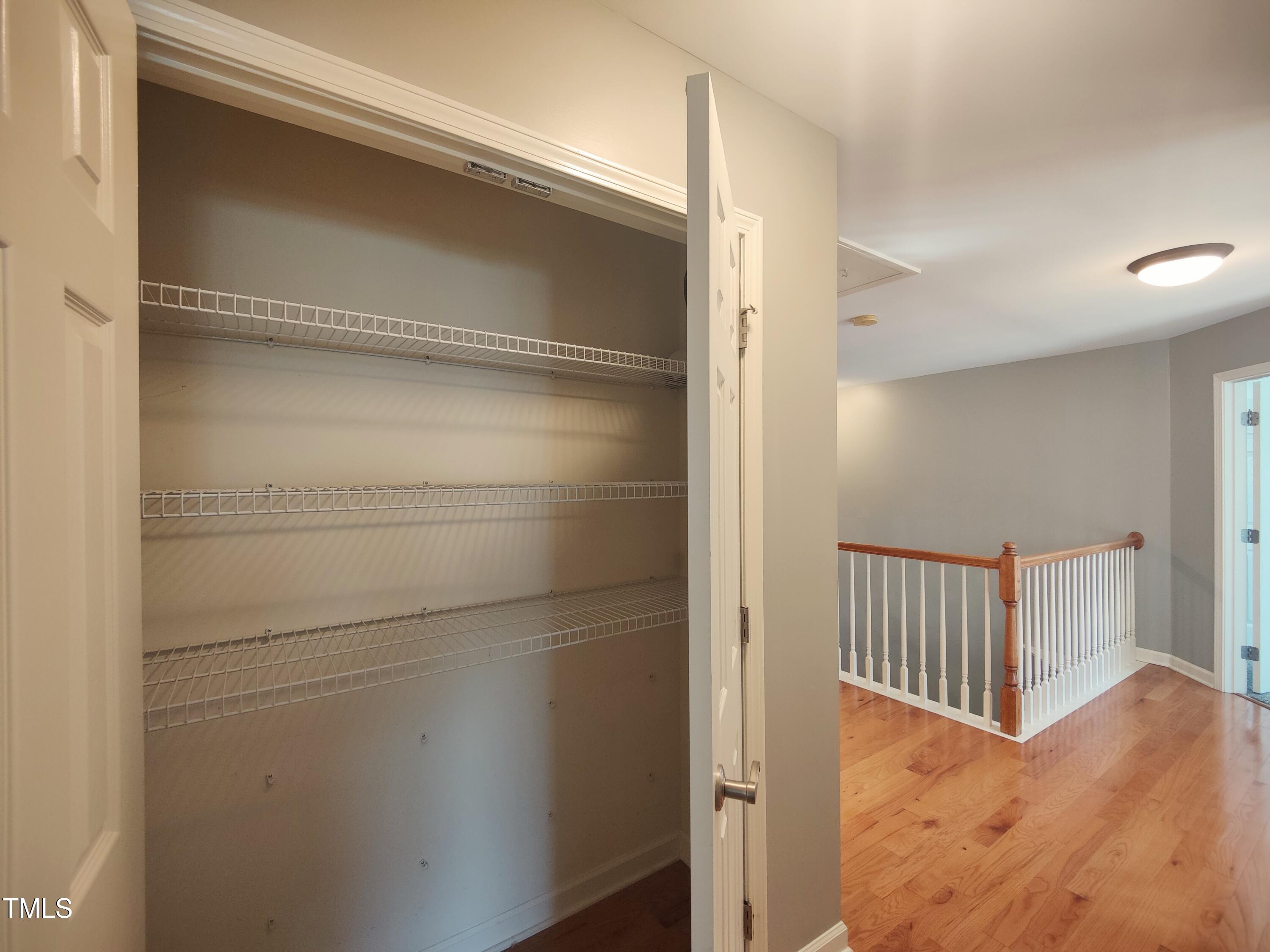 5321 Glass Ridge Road Raleigh, NC 27616 - Photo 62 of 74 Hall Linen Closet