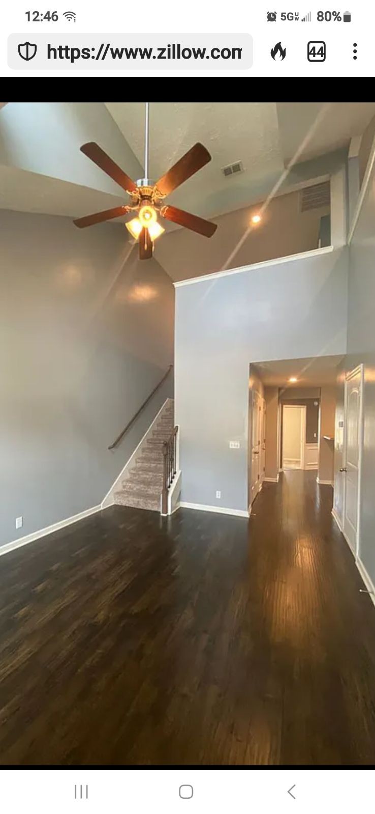 4332 Prometheus Way Murfreesboro, TN 37128 - Photo 2 of 11 a view of an empty room with kitchen view and wooden floor