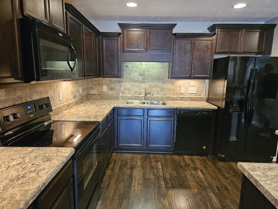 4332 Prometheus Way Murfreesboro, TN 37128 - Photo 4 of 11 a kitchen with a sink stove top oven and refrigerator