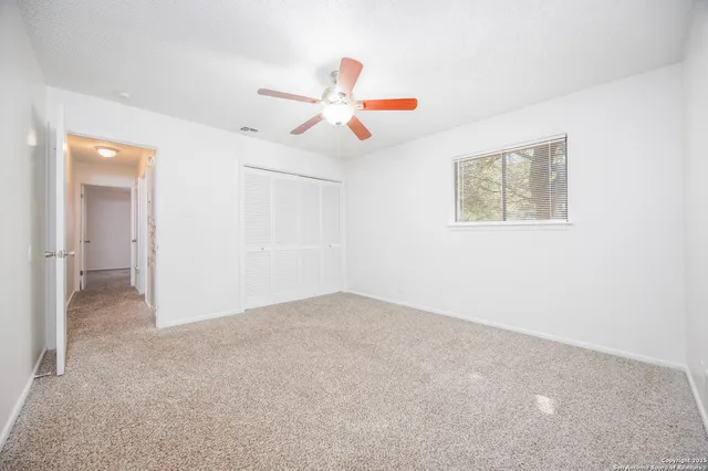 a view of a backyard of the house