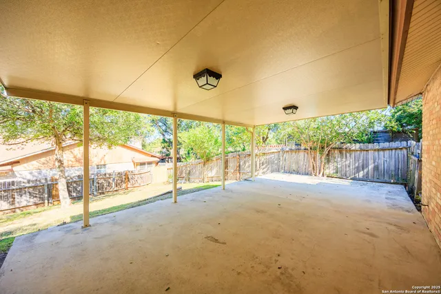 a picture of a bathroom with a shower