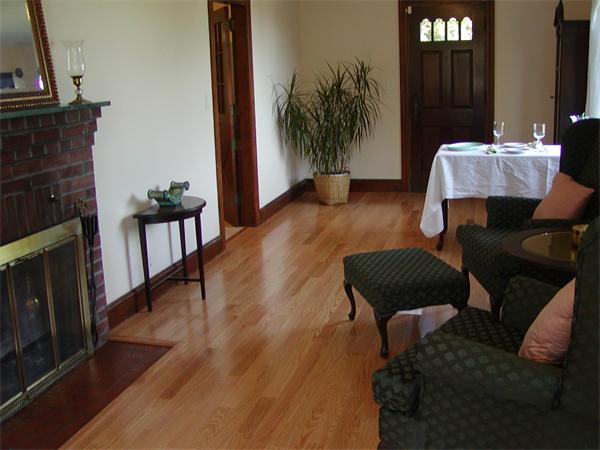 12 Shore Garden Road Hull, MA 02045 - Photo 14 of 22 a living room with furniture and a fireplace