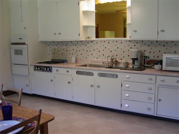 12 Shore Garden Road Hull, MA 02045 - Photo 4 of 22 a kitchen with cabinets appliances and a sink