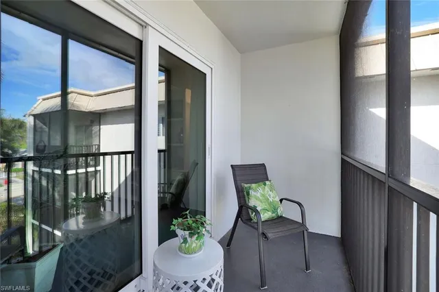a view of a porch with chairs