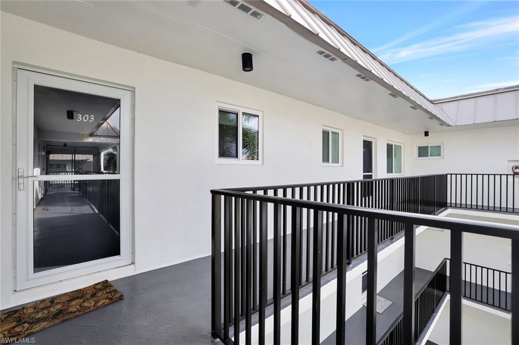766 Central Avenue, Unit 303 Naples, FL 34102 - Photo 24 of 25 a view of a porch