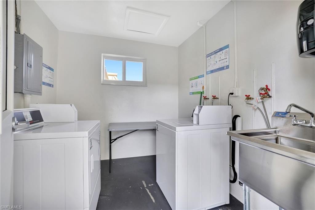 766 Central Avenue, Unit 303 Naples, FL 34102 - Photo 25 of 25 a room with storage and utility