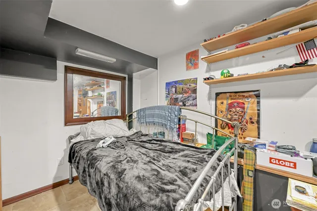 a workspace with furniture and a flat screen tv