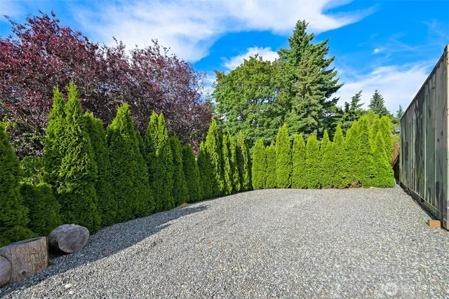 a view of a park with swings and slides