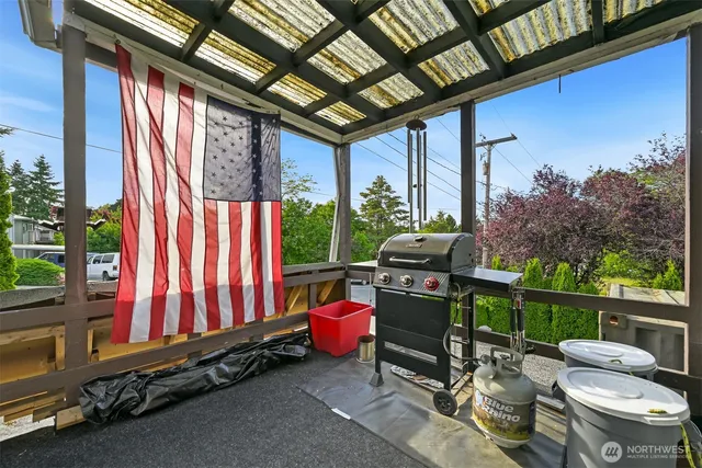 a room with furniture and wooden floor