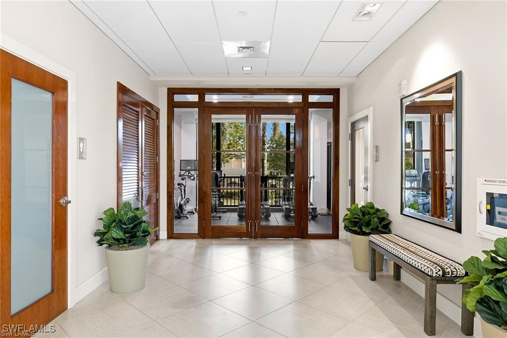 5601 Turtle Bay Drive, Unit 302 Naples, FL 34108 - Photo 37 of 44 a view of a entryway door front of the house