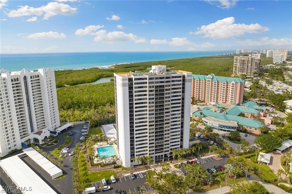 5601 Turtle Bay Drive, Unit 302 Naples, FL 34108 - Photo 41 of 44 a view of a city with tall buildings