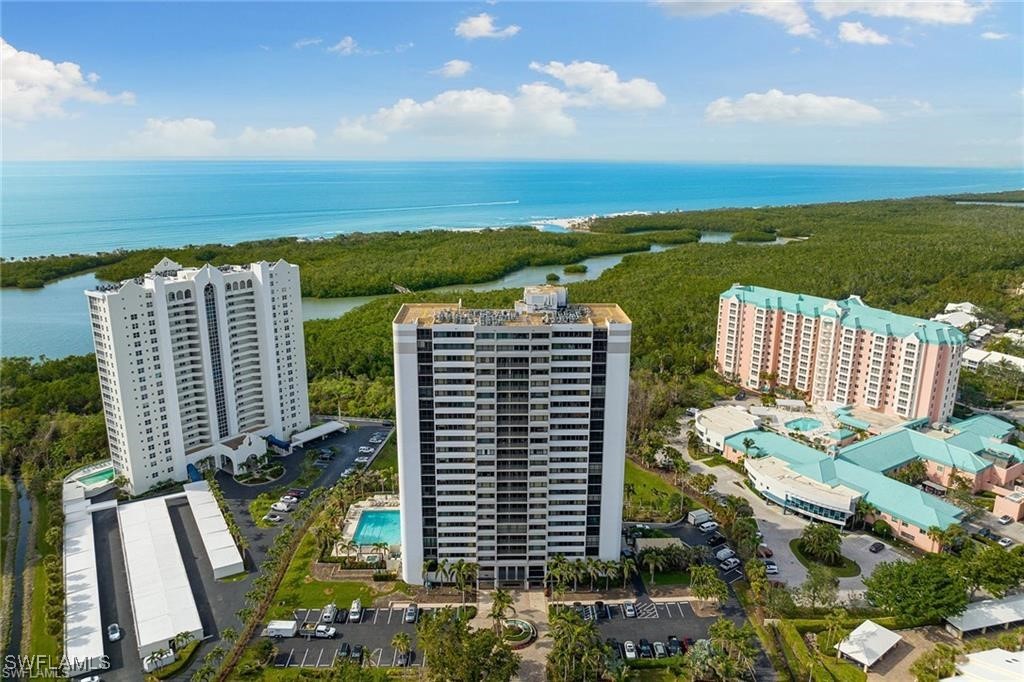 5601 Turtle Bay Drive, Unit 302 Naples, FL 34108 - Photo 43 of 44 an aerial view of city and lake