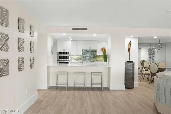 $7,000 | 5601 Turtle Bay Drive, Unit 302, Naples, FL 34108