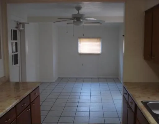 a view of an empty room and window