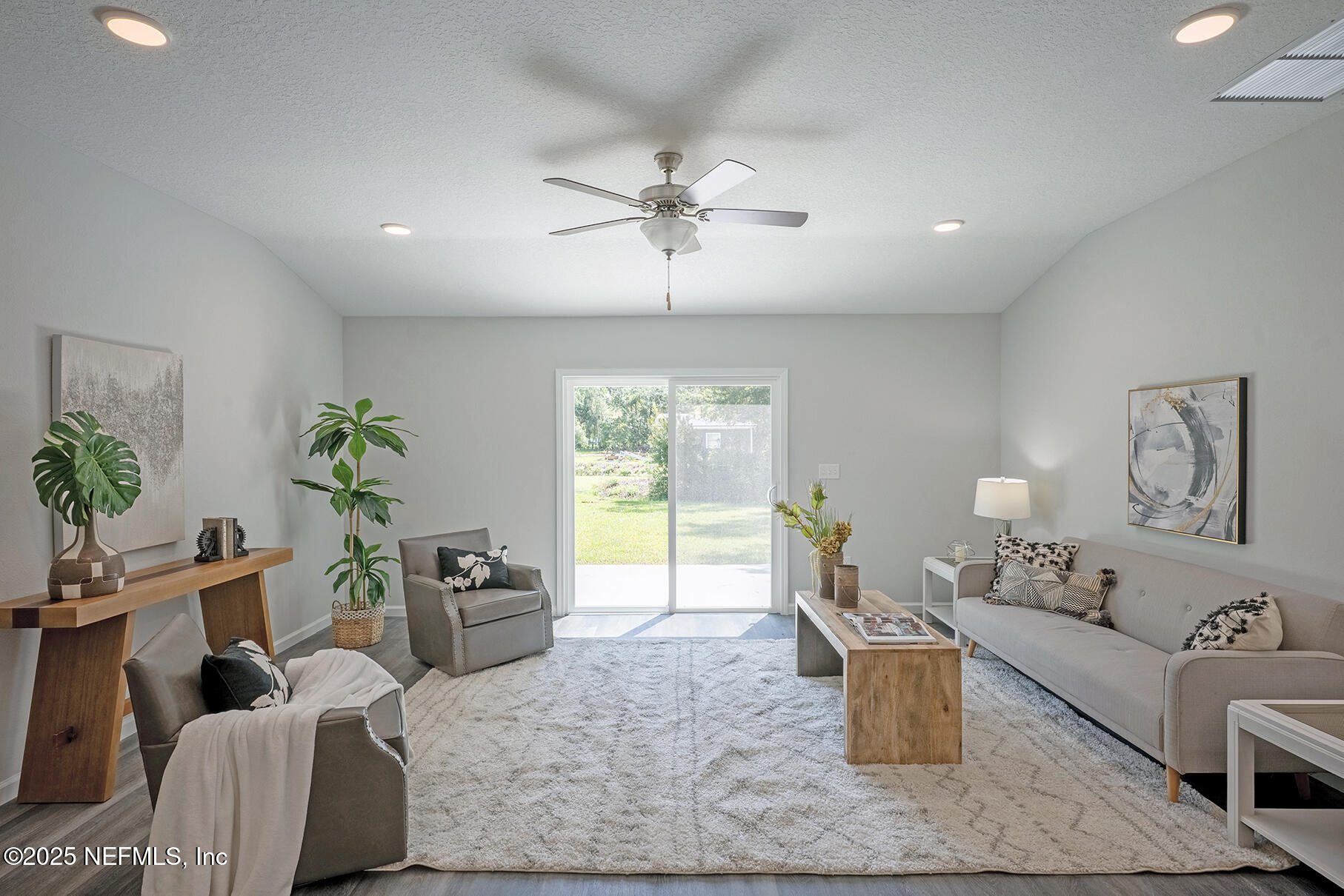 8768 Orme Road Jacksonville, FL 32220 - Photo 13 of 36 a living room with furniture