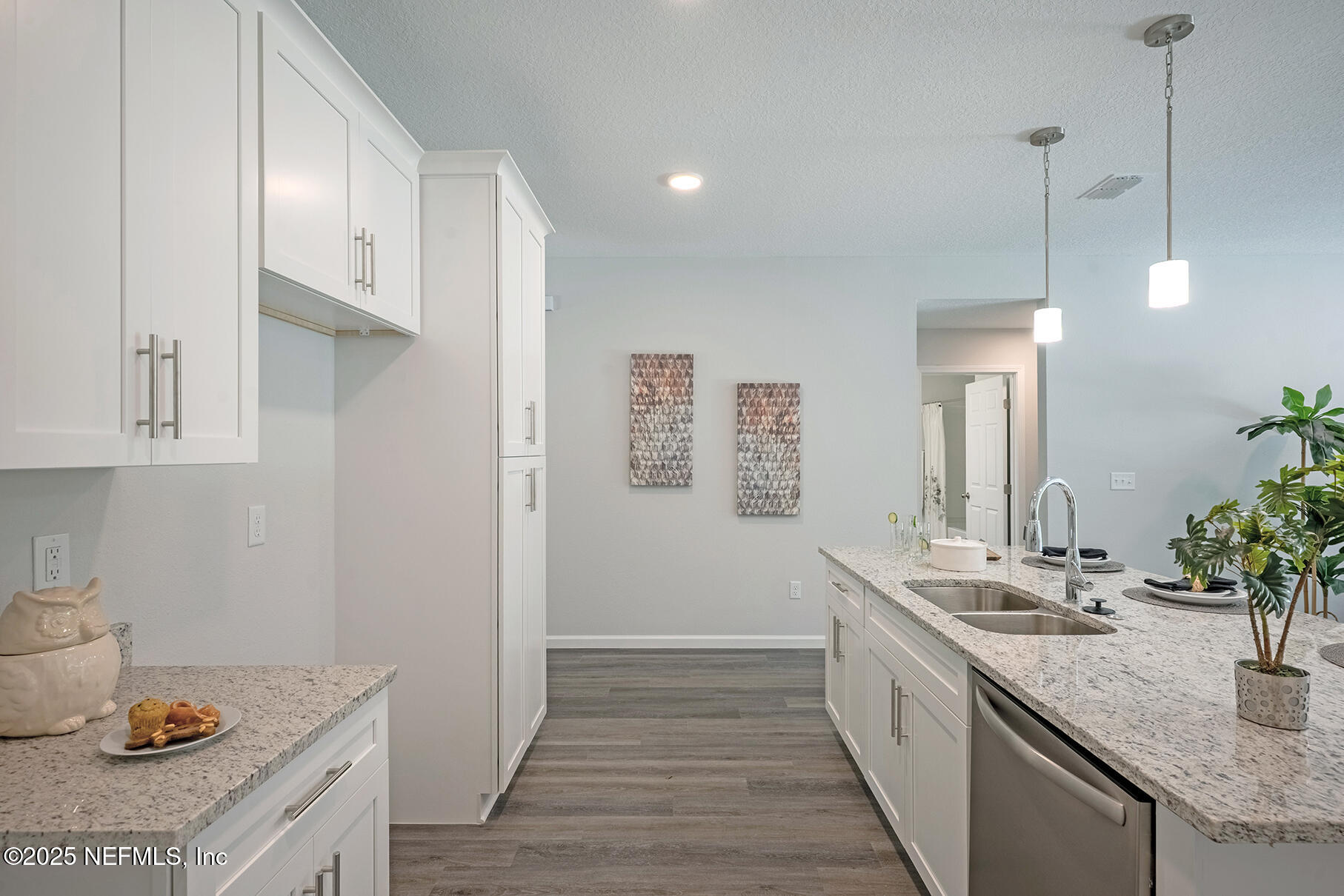 8768 Orme Road Jacksonville, FL 32220 - Photo 20 of 36 a bathroom with a sink and a mirror