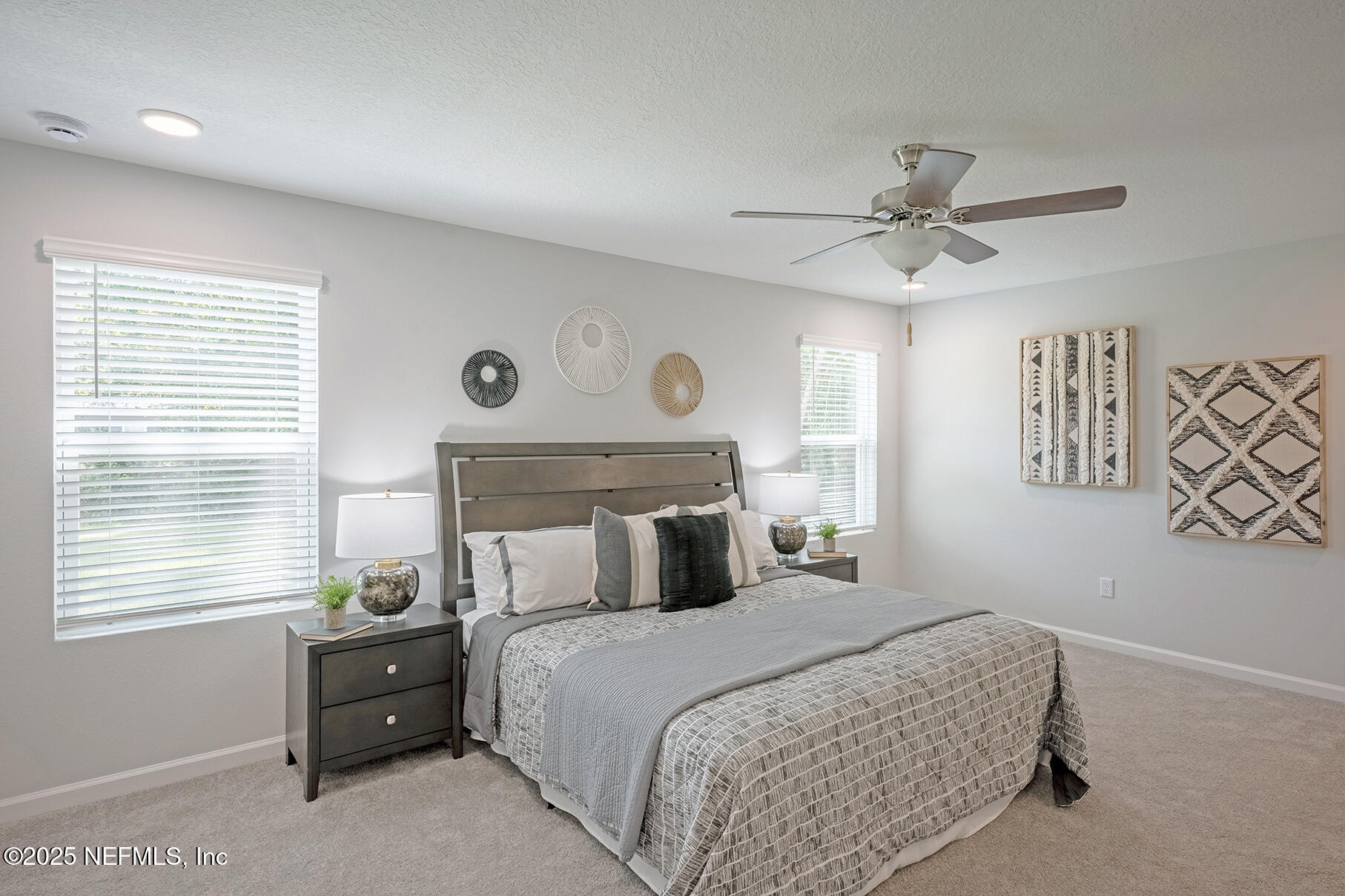 8768 Orme Road Jacksonville, FL 32220 - Photo 25 of 36 a bedroom with a bed and a window