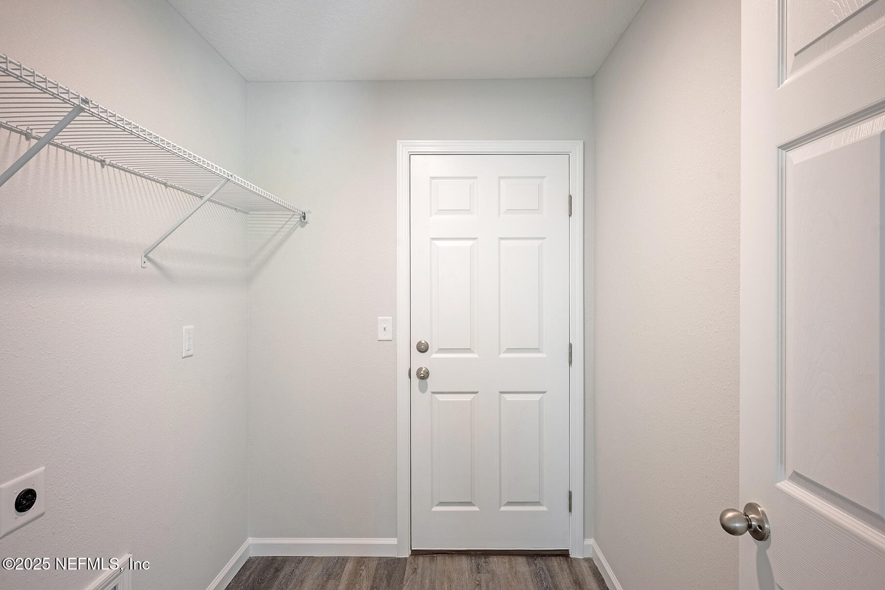 8768 Orme Road Jacksonville, FL 32220 - Photo 31 of 36 a view of small space with racks on the wall