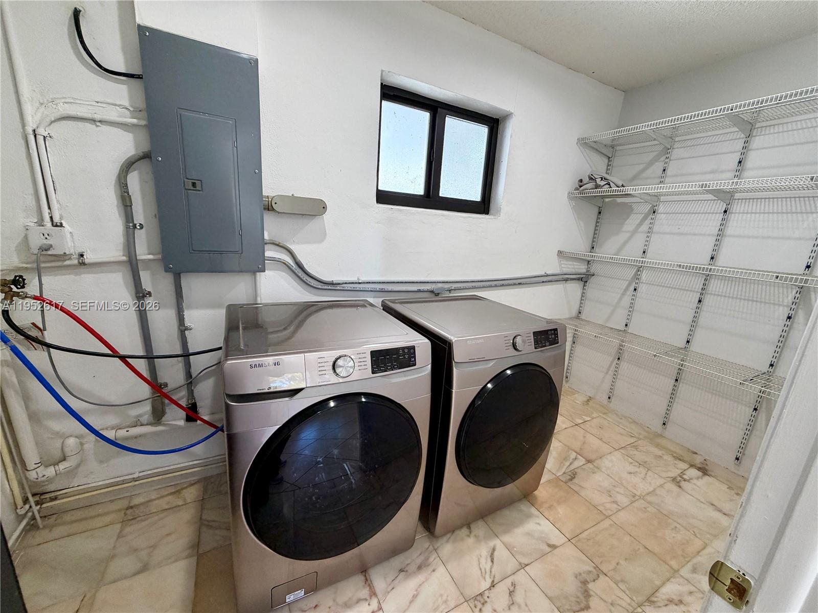 16320 Southwest 278th Street Homestead, FL 33031 - Photo 18 of 69 a utility room with dryer and washer