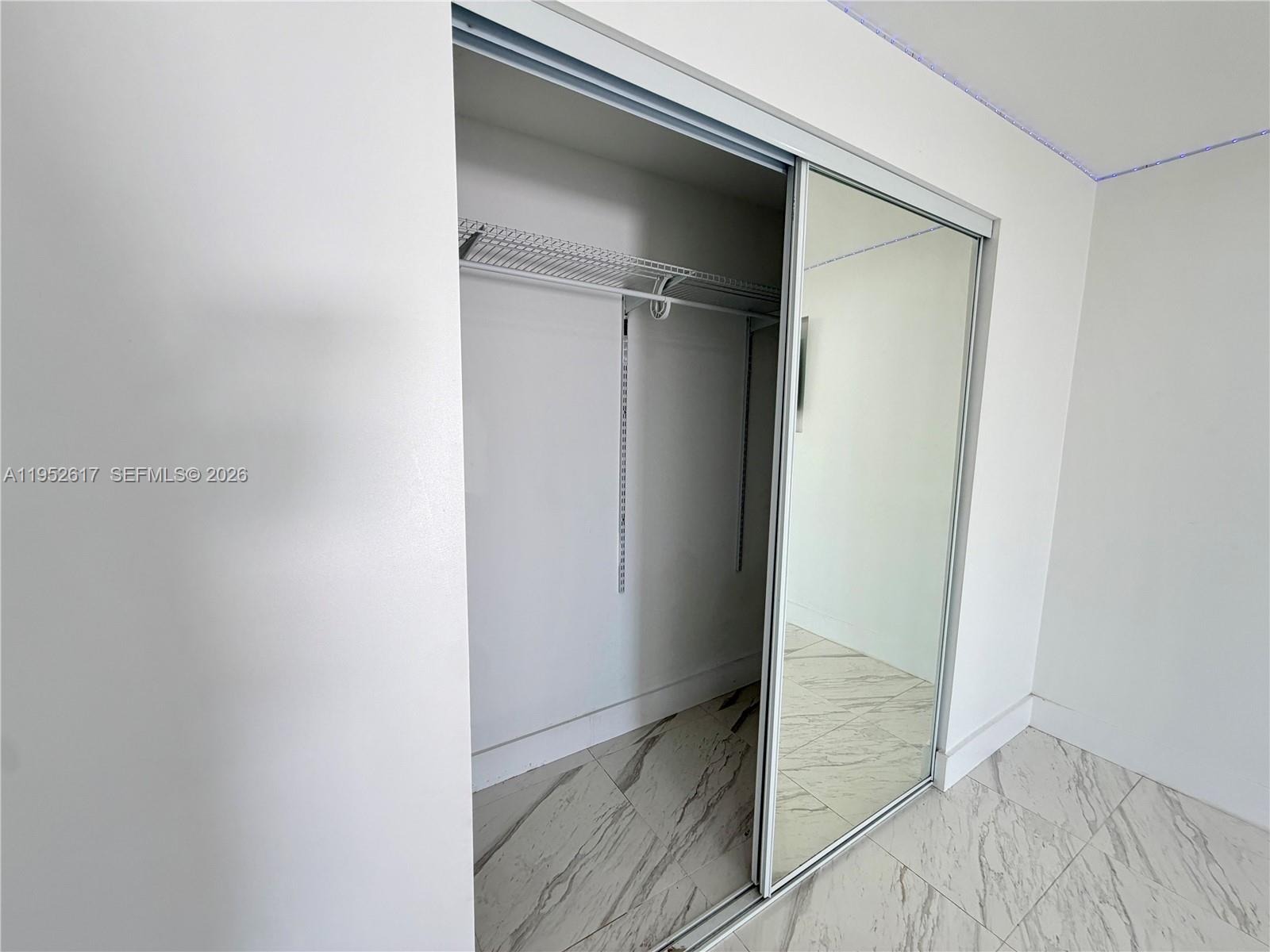 16320 Southwest 278th Street Homestead, FL 33031 - Photo 21 of 69 a view of a hallway with closet