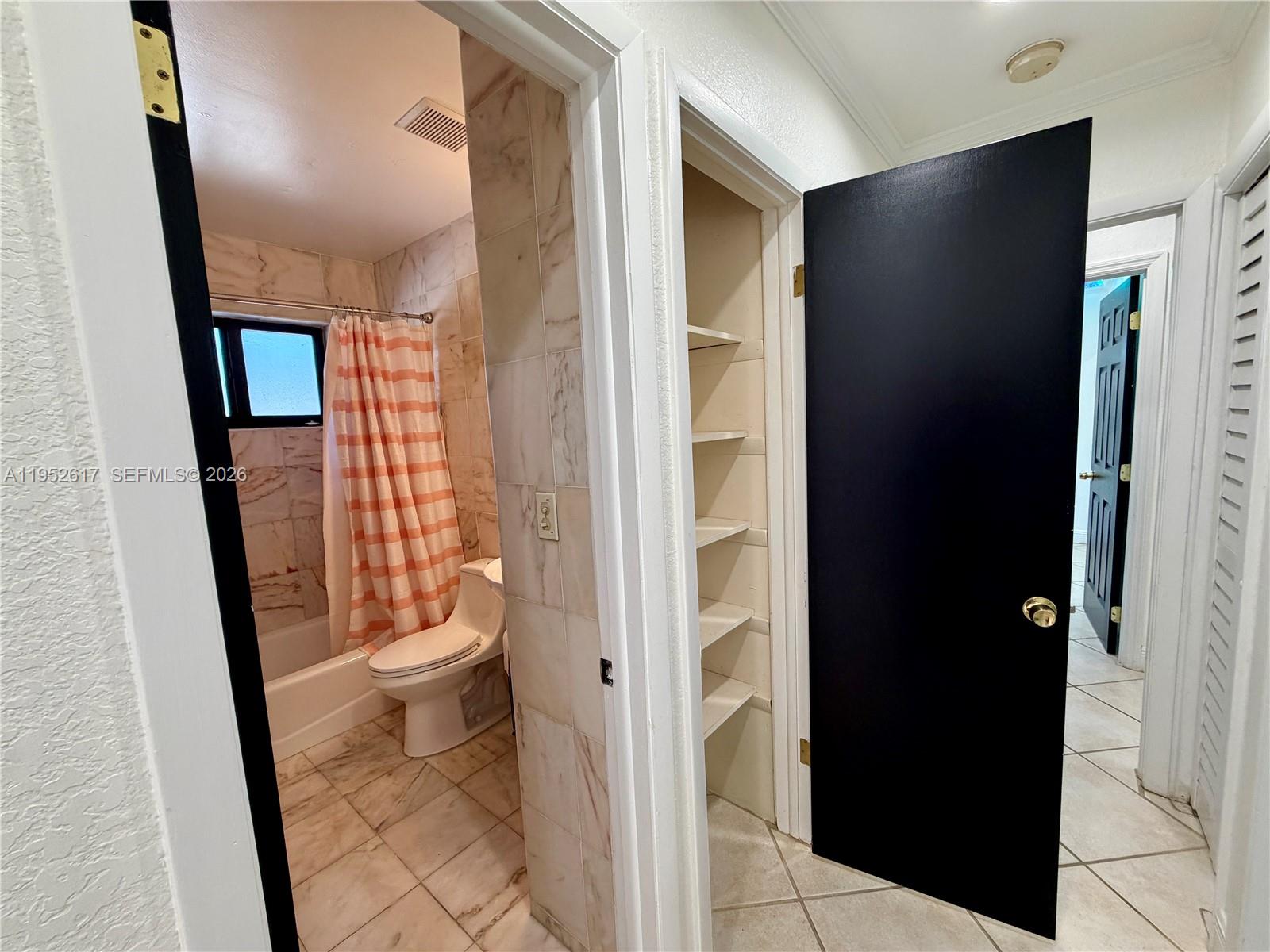 16320 Southwest 278th Street Homestead, FL 33031 - Photo 25 of 69 a bathroom with a sink and a toilet