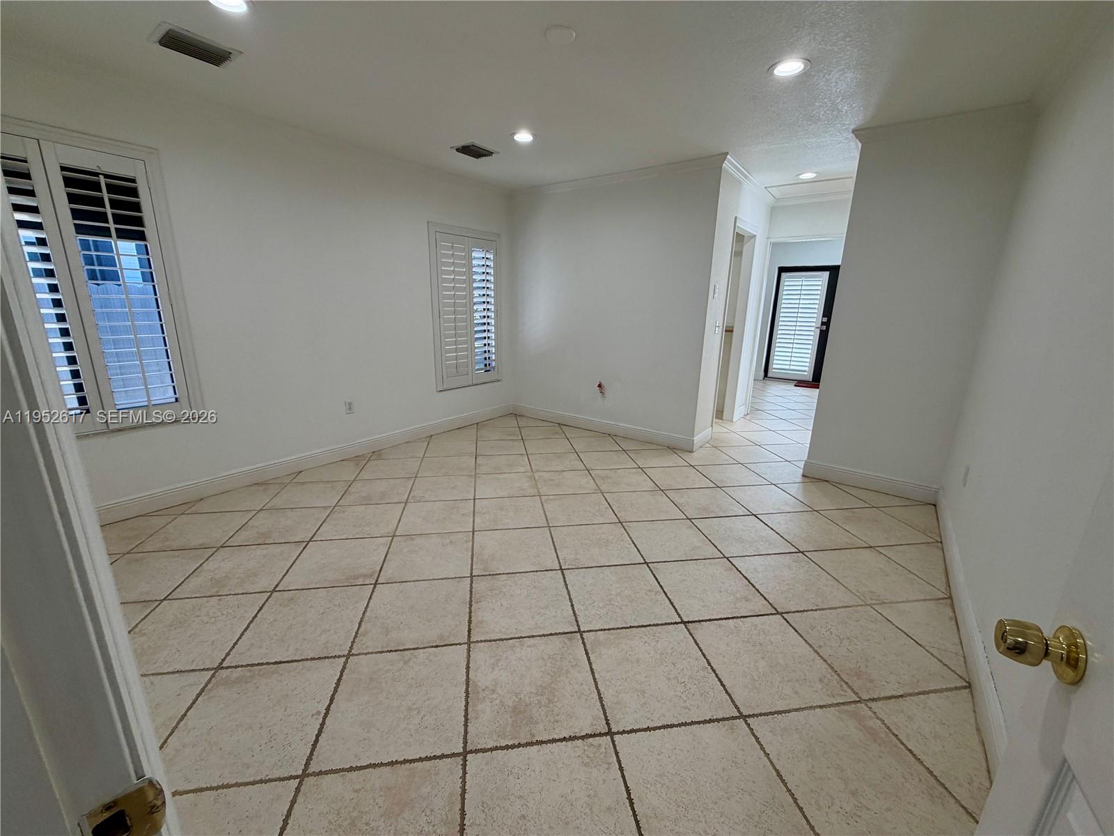 16320 Southwest 278th Street Homestead, FL 33031 - Photo 32 of 69 a view of an empty room and window